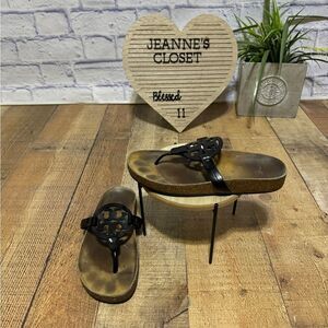 Tory Burch miller cloud patent black sandals
Size 7